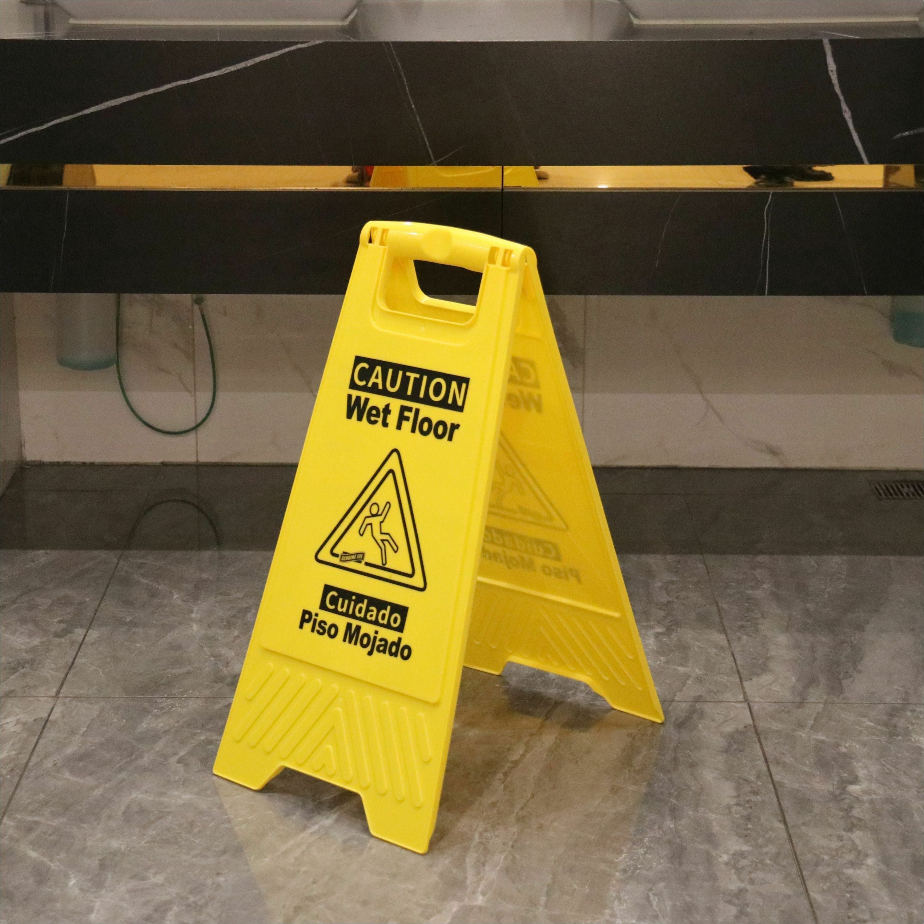 Genuine Joe Universal Graphic Wet Floor Sign - 1 Each - English, Spanish - Wet Floor Print/Message - Foldable - Yellow